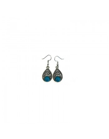 Boucles d'oreilles pendantes en métal argenté ciselé serties de pierres bleu claire 