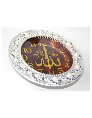 Horloge islamique avec parties dorées et cadre rond argenté 