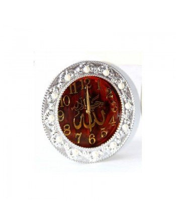 Horloge islamique avec parties dorées et cadre rond argenté 