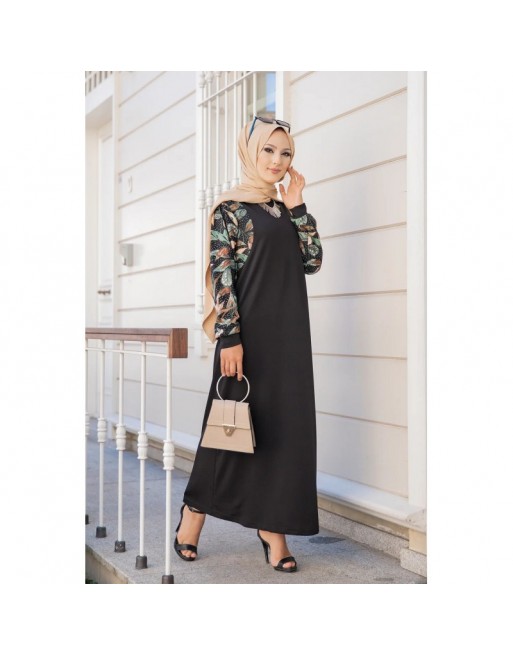 Robe longue noire motifs fleuris "jungle" (Abaya hijab moderne) Robe longue noire motifs fleuris "jungle" (Abaya hijab moderne)