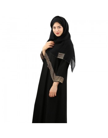 Robe Dubai noire ornée de strass dorés avec son châle assorti (hijab) pour femme voilée 