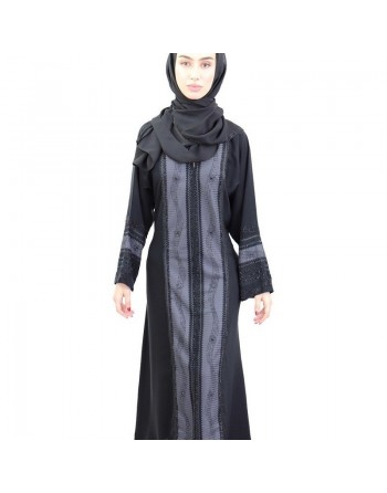 Abaya Dubaï noire satinée avec nombreux strass noirs et broderies avec son écharpe assortie 