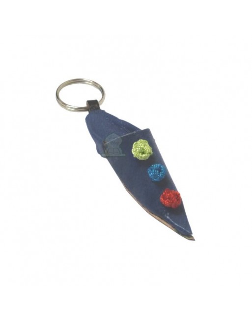 Porte-clés babouche traditionnelle marocaine en cuir bleu avec nœuds décoratifs Porte-clés babouche traditionnelle marocaine en cuir bleu avec nœuds décoratifs